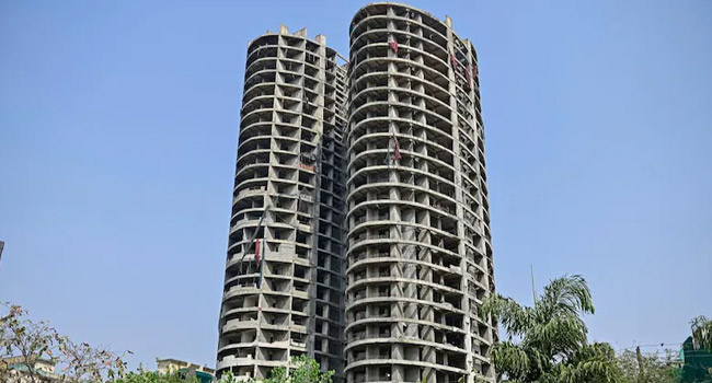 Noida Twin Towers Demolition : అంతా రెడీ.. 9 సెకన్లలో 40 అంతస్థుల భవంతి మటాష్.. ఎలాగో తెలుసా..