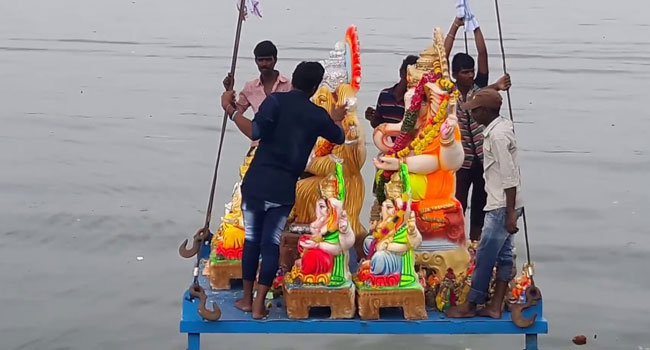Ganesh immersion: హుస్సేన్‌సాగర్‌లో గణేష్ నిమజ్జనంపై తొలగిన వివాదం