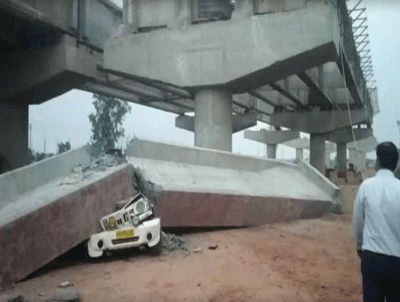 నిర్మాణంలో ఉన్న వంతెన కూలి ఇద్దరి మృతి | two dead in under construction ...