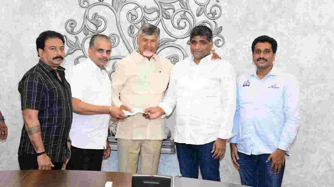 NRI: ఏపీ సీఎం సహాయనిధికి ‘నాక్స్’ రూ.30 లక్షల విరాళం