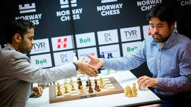 అర్జున్‌ విజయం.టాప్‌లో హంపి