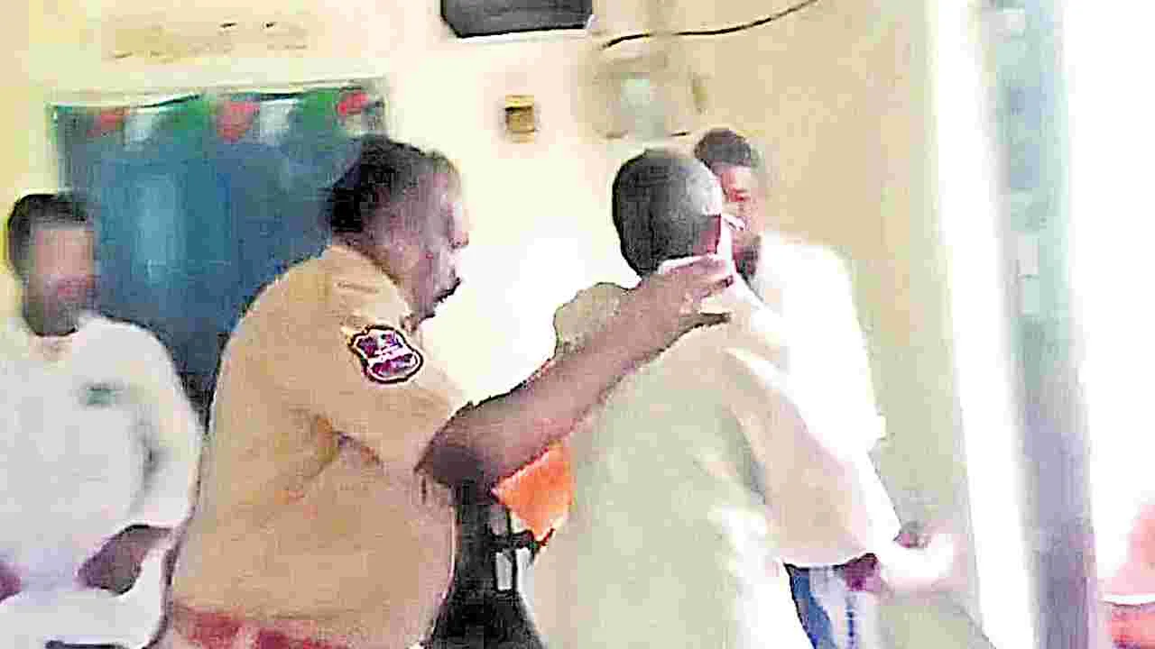 Nirmal: భూభారతిలో ఏఎస్సై అతి