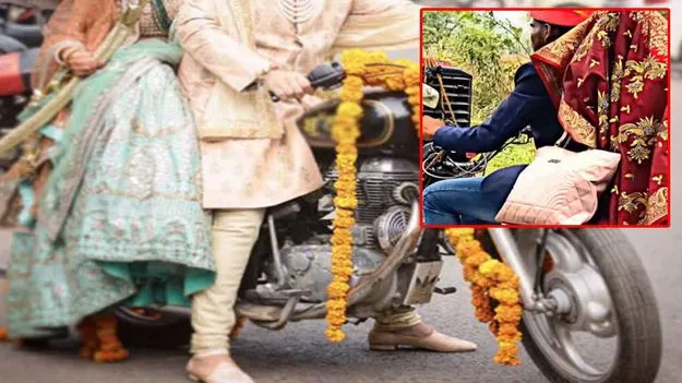 Bride And Groom Viral Videos: టీవీఎస్పై వెళ్తున్న వధూవరులు.. ముందు వైపు చూడగా అవాక్కయ్యే సీన్.. వరుడి ప్లానింగ్ చూస్తే..
