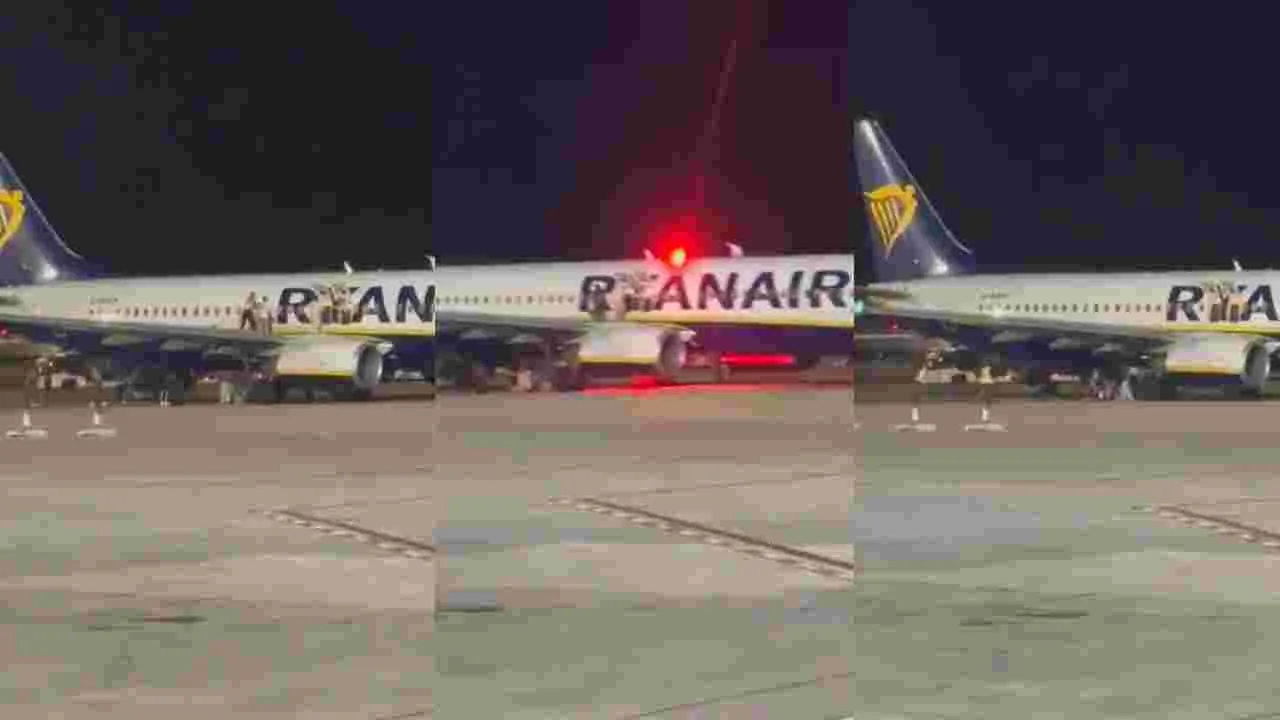 Ryanair Fire alert Scare: స్పెయిన్ విమానంలో ఫైర్ అలర్ట్.. రెక్కలపై నుంచి కిందకు దూకేసిన ప్రయాణికులు 