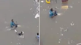 Viral Video: వామ్మో.. అంత వరదలో బైక్ మీద ఎలా వెళ్తున్నాడో చూడండి.. వీడియో వైరల్..