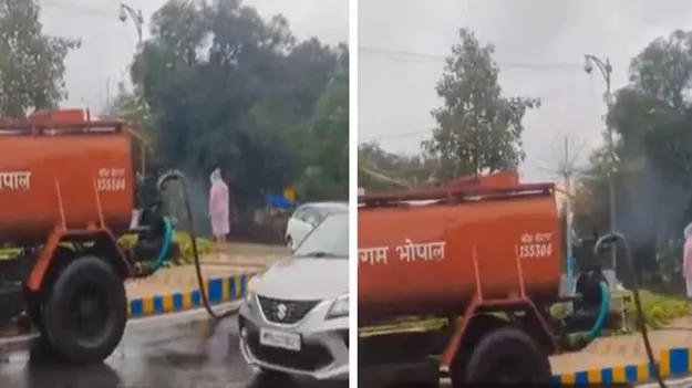 Watering in Rain: మెదడు ఎక్కడుందో మరి.. వర్షంలో కూడా మొక్కలకు నీళ్లు పోస్తున్న సిబ్బంది..