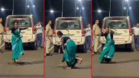 Woman Dance Viral Video: పోలీసు వాహనం ముందే మహిళ డాన్స్.. నెటిజన్ల రియాక్షన్స్ చూస్తే.. 
