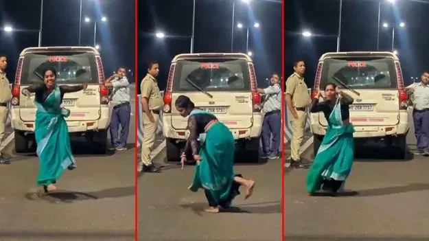 Woman Dance Viral Video: పోలీసు వాహనం ముందే మహిళ డాన్స్.. నెటిజన్ల రియాక్షన్స్ చూస్తే.. 