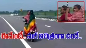 Funny Trending Video: స్కూటీపై ఫన్నీ సీన్.. మధ్యలో కూర్చుని ఈమె చేస్తున్న పని చూస్తే..