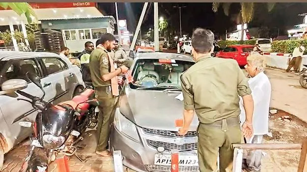 అన్యమత స్టిక్కర్లతో శ్రీశైలంలోకి కారు