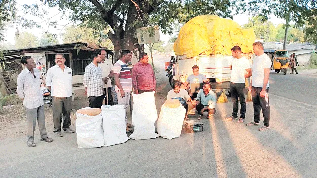 తవుడు కింద గంజాయి బస్తాలు 