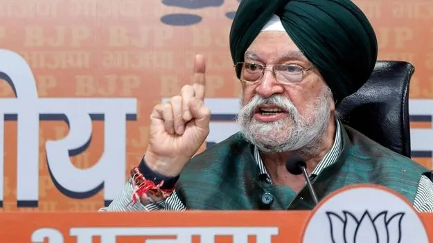 కేంద్ర మంత్రి  హర్దీప్‌సింగ్‌ పురీ రాజీనామాకు విపక్షాల పట్టు