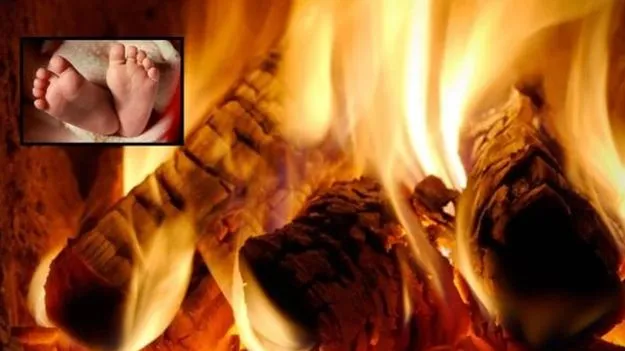 ఏడుస్తున్నాడనే కోపంతో బిడ్డను మంటల్లో వేసిన తల్లి