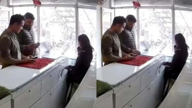 చోరీ చేస్తూ రెడ్ హ్యాండెడ్‌గా దొరికిన పోలీసులు.. వీడియో వైరల్