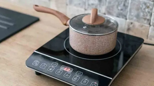 గ్యాస్ సిలిండర్ల కొరత.. ఇండక్షన్‌ స్టవ్‌లకు పెరిగిన డిమాండ్