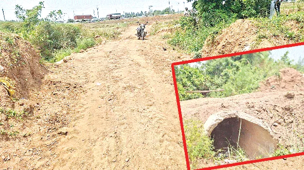 కాలువను కప్పేసి.. మట్టి తరలించి 