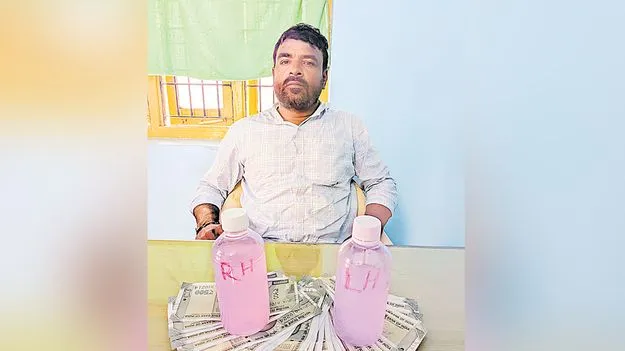 ఇంటి నెంబరు ఇచ్చేందుకు లంచం