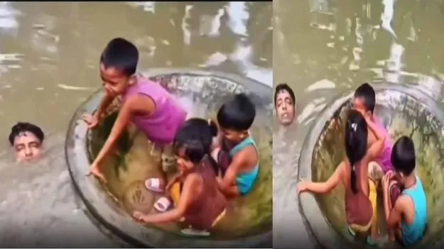 టబ్‌లో పిల్లలు.. మెడలోతు నీటిలో తండ్రి పోరాటం.. వీడియో వైరల్