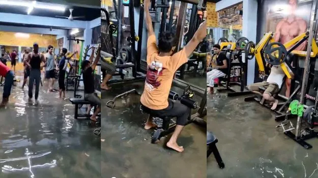 జిమ్‌లో నీళ్లు.. ఆగని వర్కవుట్లు.. వీడియో వైరల్