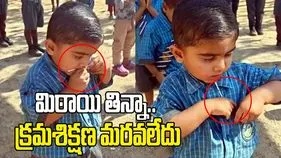 ప్రార్థన జరుగుతుండగా చిన్నారి ఏం చేశాడో తెలుసా? వైరల్ అవుతున్న ఫన్నీ వీడియో