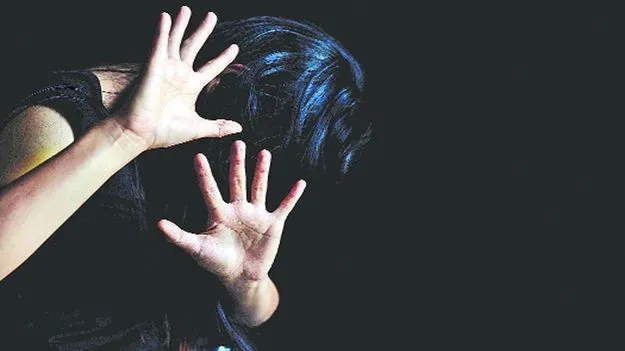 మహిళపై దంపతుల దాడి