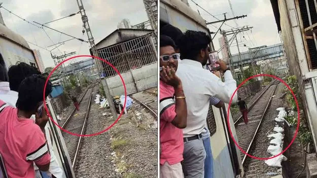 రైలు పట్టాలపై అతి.. రైలు ముందు తాపీగా నడస్తూ..