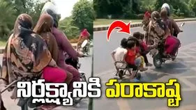 బైక్‌కు ట్రాలీ కట్టి.. అందులో చిన్న పిల్లలతో ప్రయాణం