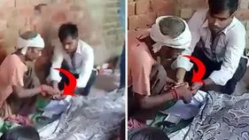 అంత్యక్రియలకు ముందు మృతుడి బొటనవేలి ముద్రలు.. వీడియో వైరల్