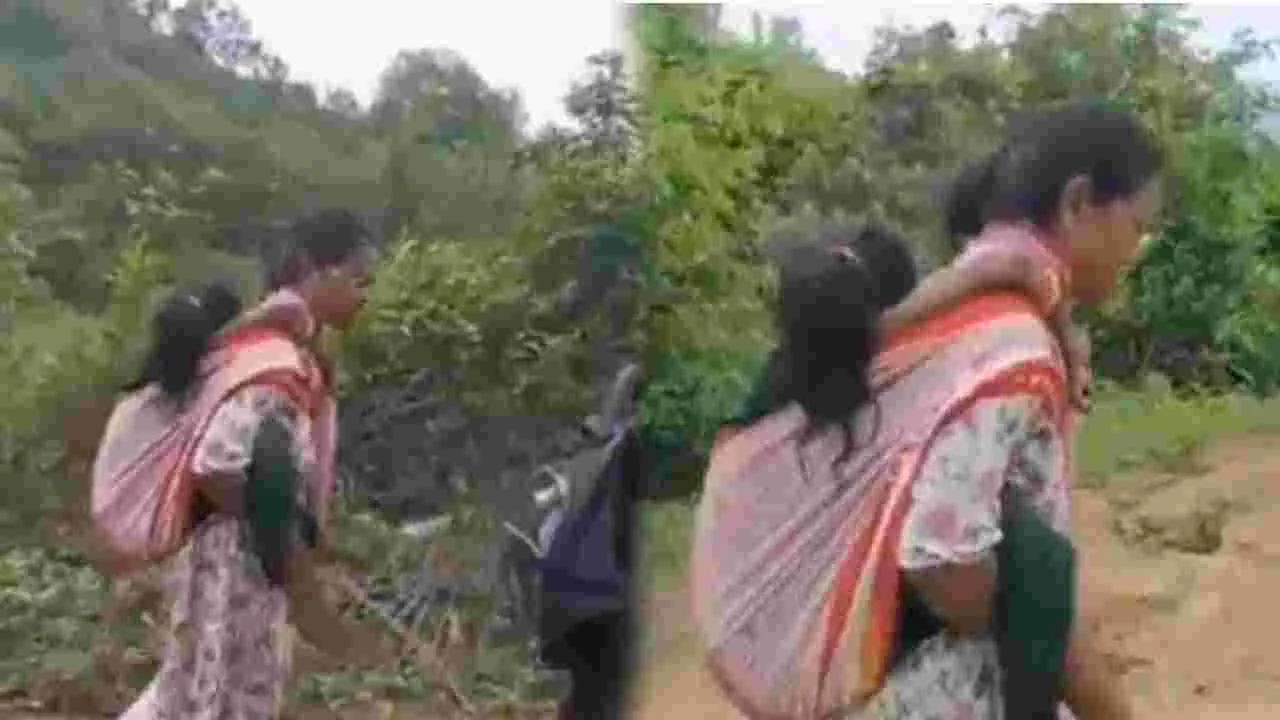 విధి నిర్వహణలో మానవత్వం.. భుజాన మోసి బాలిక ప్రాణం కాపాడిన వార్డెన్