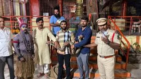 గణేశ్ నిమజ్జన వేడుకల్లో కొండచిలువతో డ్యాన్స్.. విశాఖ టీమ్‌పై చర్యలు