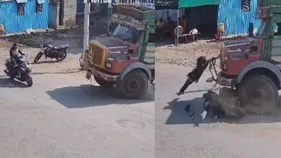 స్కూటీని ఢీకొట్టిన ట్రక్కు.. ప్రాణాలతో బయటపడిన యువతి..